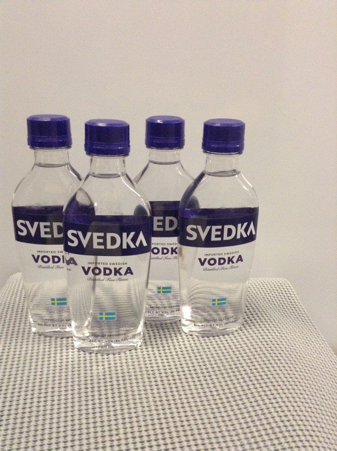 Lot of 4 Svedka Vodka 200ML each: Any contents in bottle is Free; You are bidding on the bottle & unbroken tax stamp