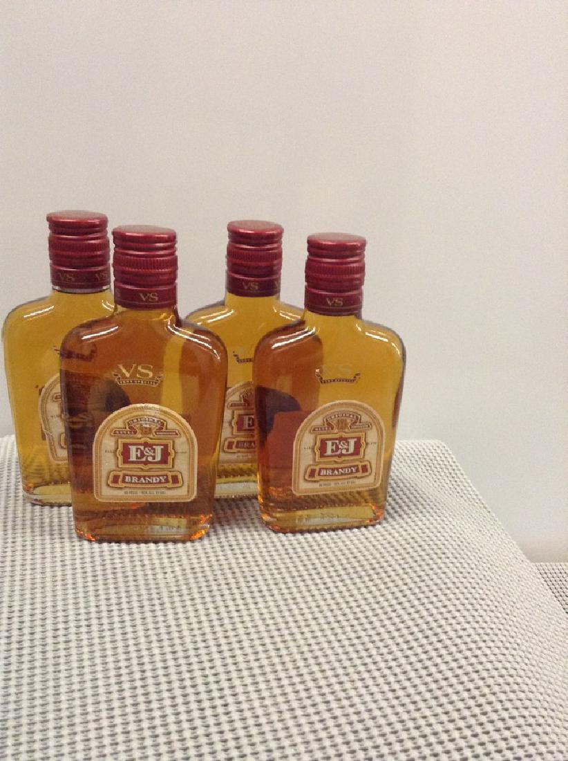 Lot of 4 E&J Brandy 200ML each: Any contents in bottle is Free; You are bidding on the bottle & unbroken tax stamp