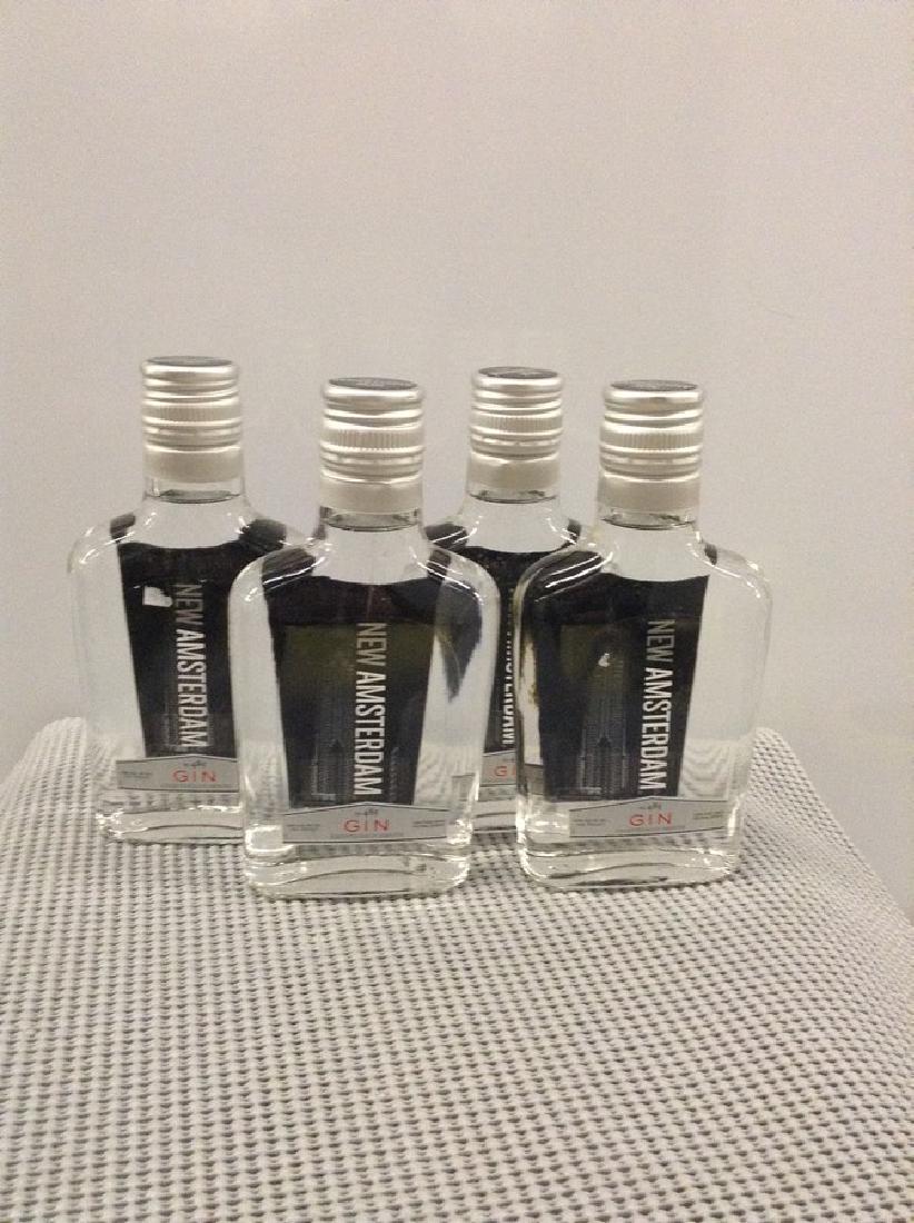 Lot of 4 New Amsterdam Gin 200ML: Any contents in bottle is Free; You are bidding on the bottle & unbroken tax stamp