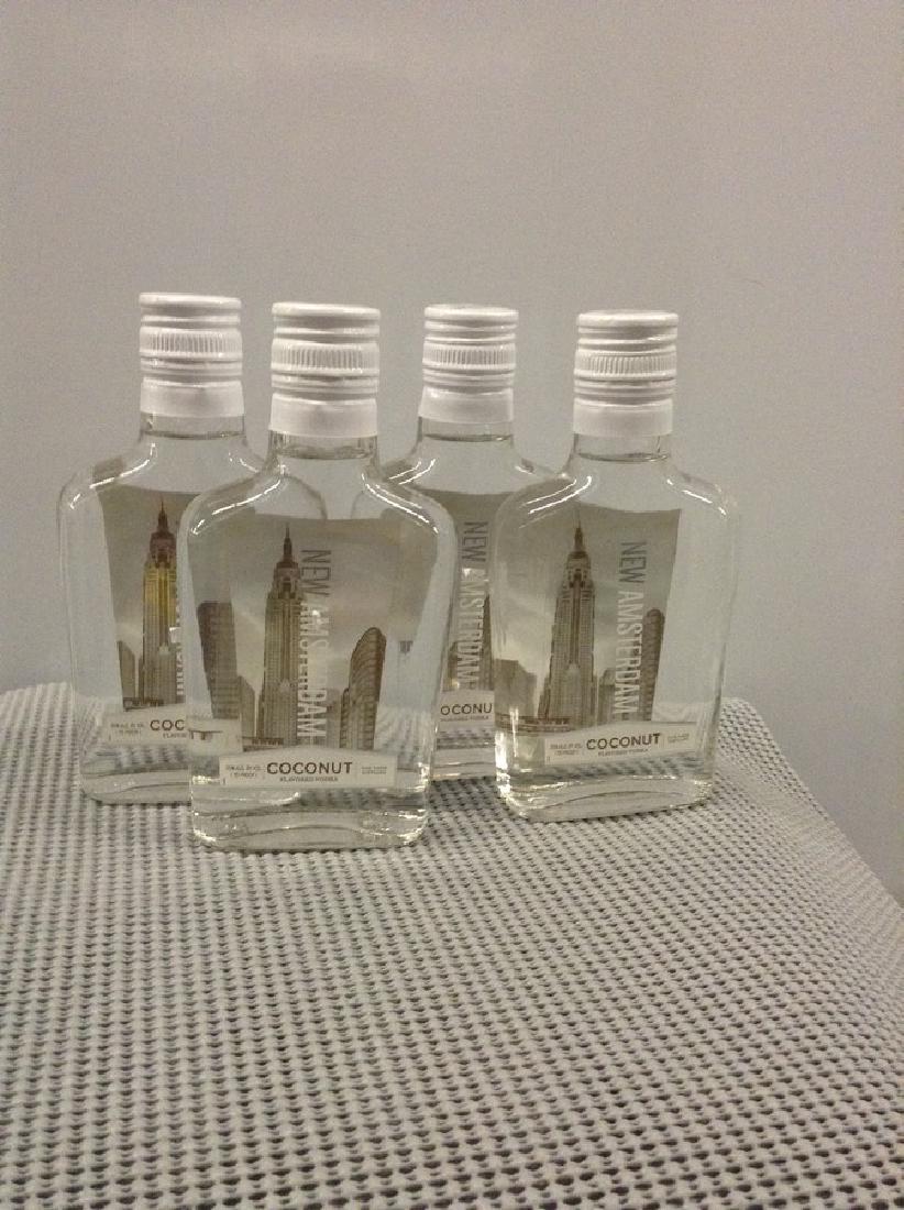 Lot of 4 New Amsterdam Coconut Vodka 200 ML: Any contents in bottle is Free; You are bidding on the bottle & unbroken tax stamp