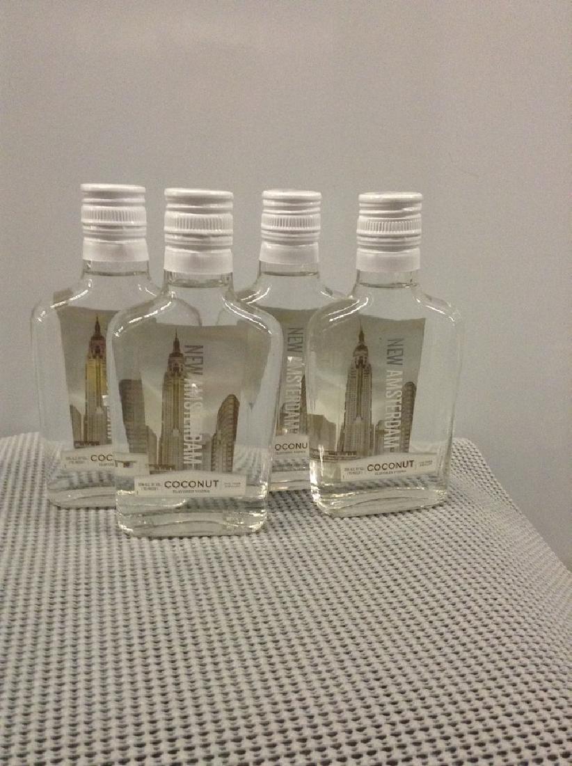 Lot of 4 New Amsterdam Coconut Vodka 200 ML: Any contents in bottle is Free; You are bidding on the bottle & unbroken tax stamp