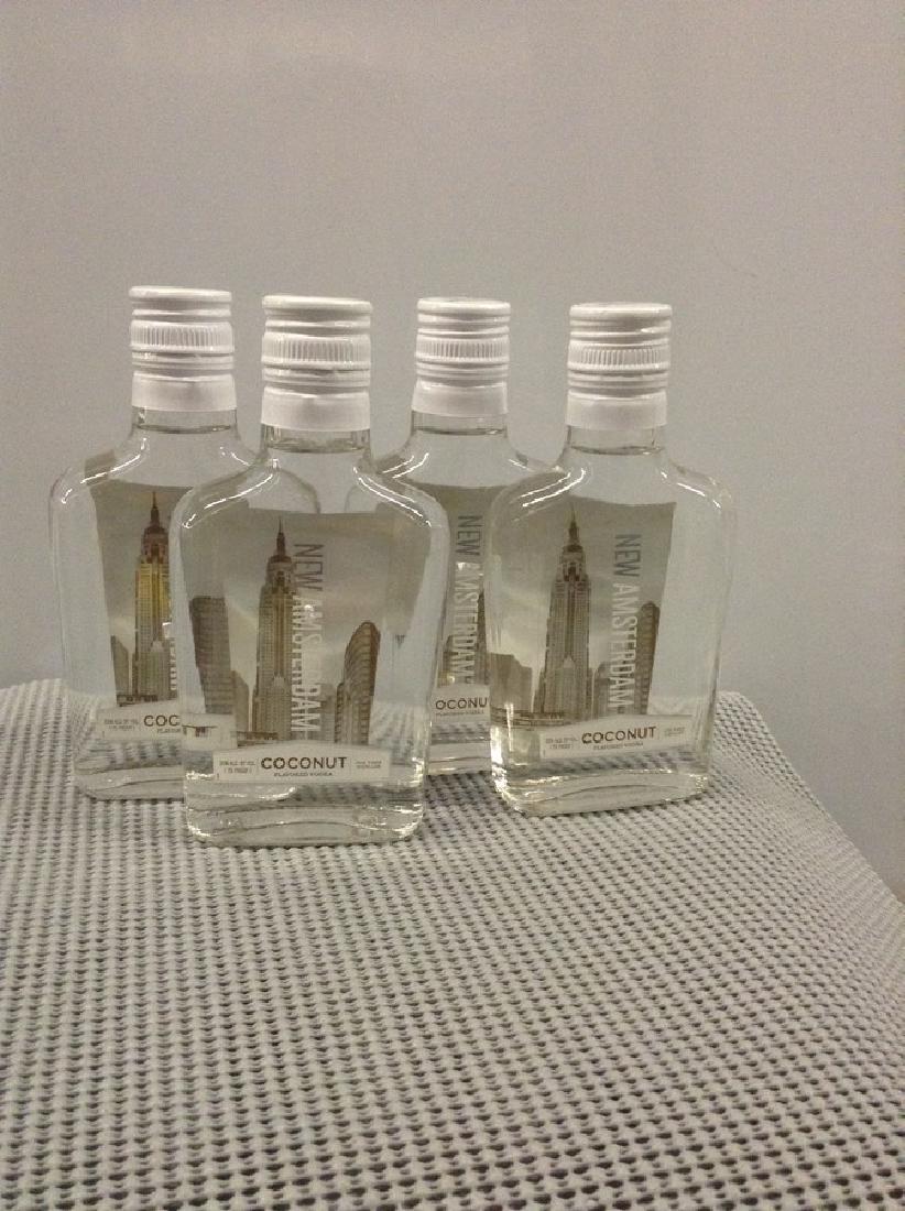 Lot of 4 New Amsterdam Coconut Vodka 200 ML: Any contents in bottle is Free; You are bidding on the bottle & unbroken tax stamp