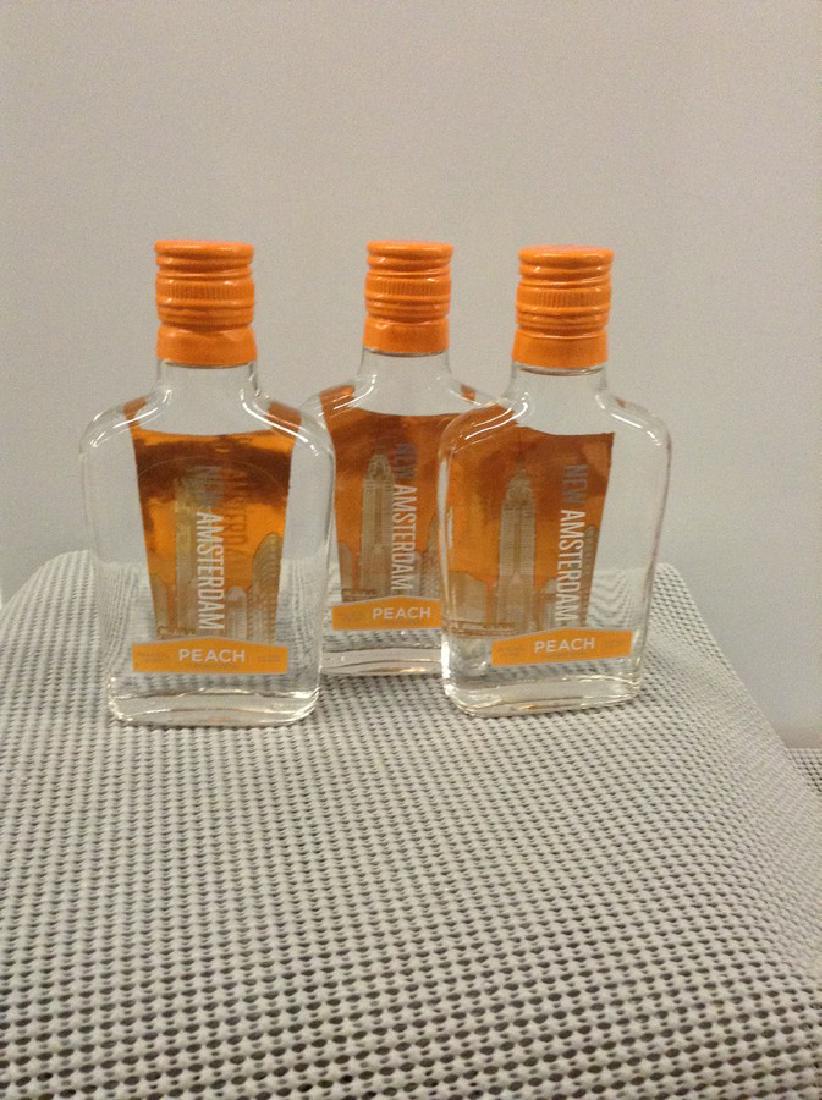 Lot of 3 New Amsterdam Peach Vodka 200ML: Any contents in bottle is Free; You are bidding on the bottle & unbroken tax stamp
