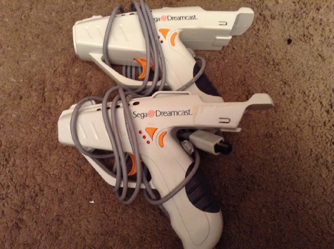 2 Sega Dreamcast Controllers (1 of 1)