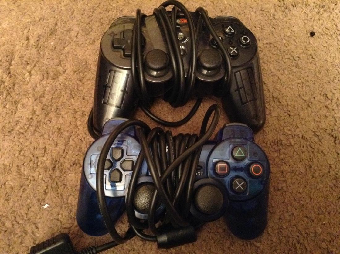 1 Sony Playstation Controller & Gamestop Controller (1 of 1)
