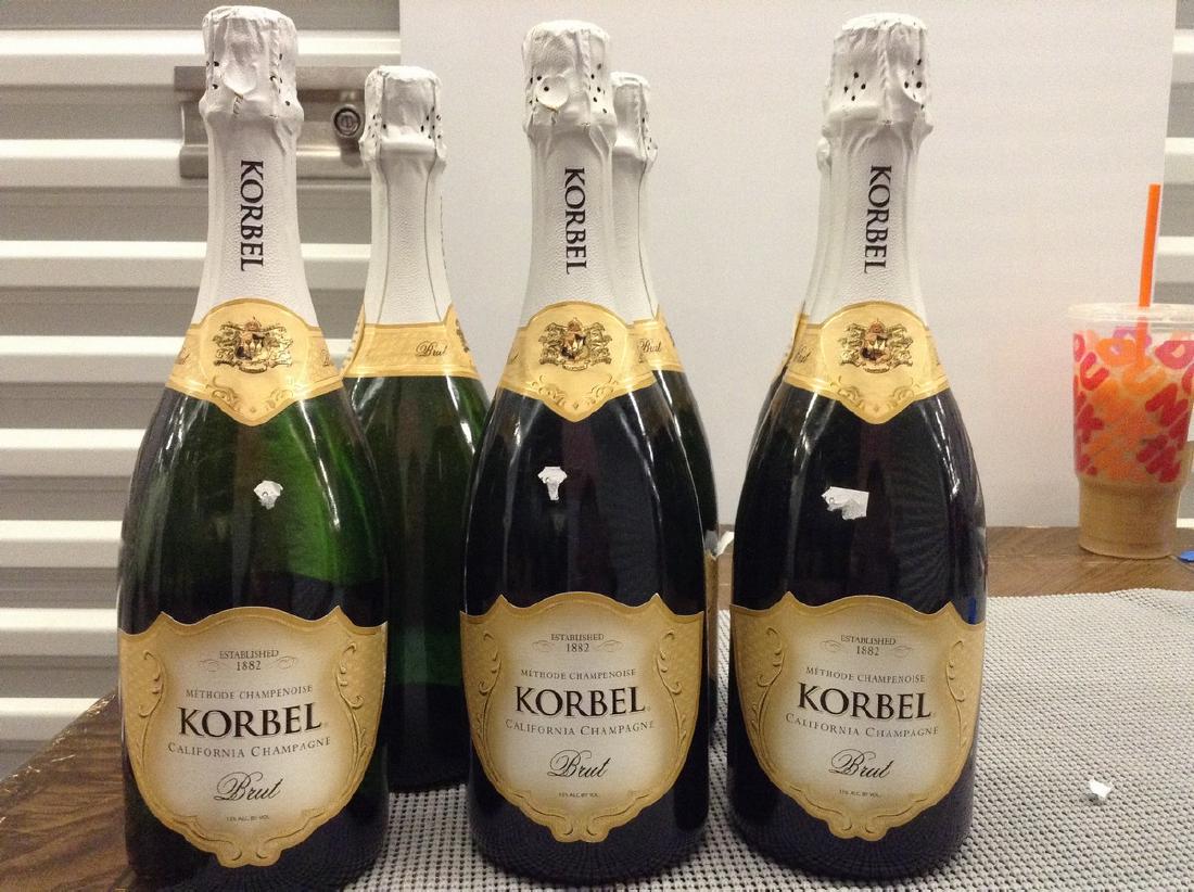 Korbel Lot of 6 Bottles: Any contents in bottle is Free; You are bidding on the bottle & unbroken tax stamp