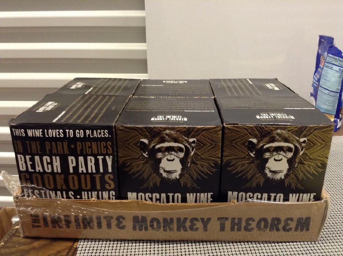Moscato Wine - Lot of 6 boxes - each box 4 cans: Any contents in bottle is Free; You are bidding on the bottle & unbroken tax stamp