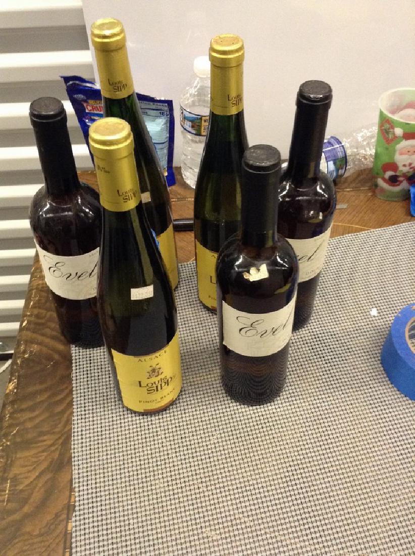6 Mixed bottles of wine: Any contents in bottle is Free; You are bidding on the bottle & unbroken tax stamp
