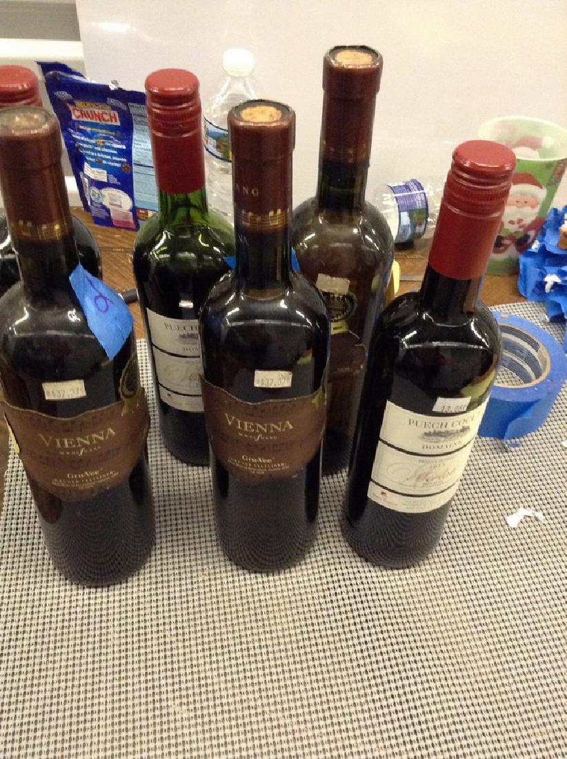 6 Mixed bottles of wine: Any contents in bottle is Free; You are bidding on the bottle & unbroken tax stamp
