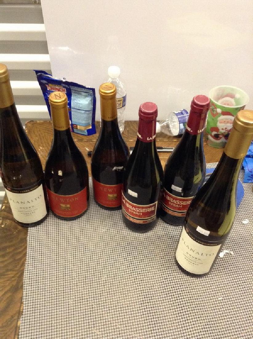 6 Mixed bottles of wine: Any contents in bottle is Free; You are bidding on the bottle & unbroken tax stamp