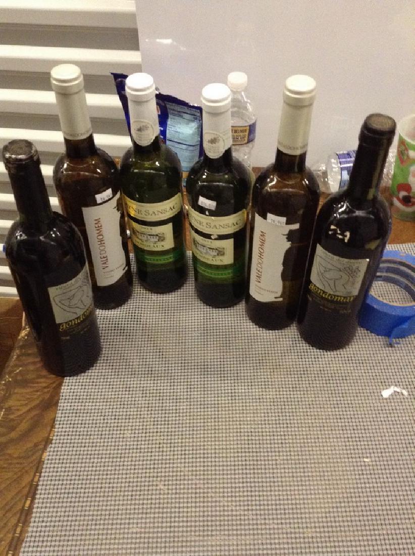 6 Mixed bottles of wine: Any contents in bottle is Free; You are bidding on the bottle & unbroken tax stamp