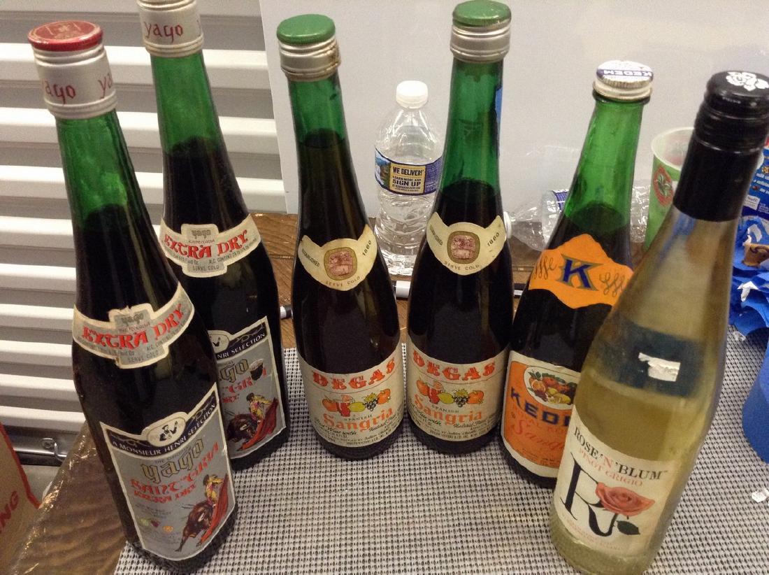 6 mixed bottles of wine: Any contents in bottle is Free; You are bidding on the bottle & unbroken tax stamp