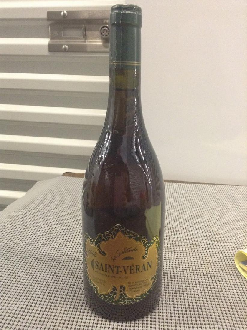 La Solitude Saint - Veran - 750ML Bottle: Any contents in bottle is Free; You are bidding on the bottle & unbroken tax stamp