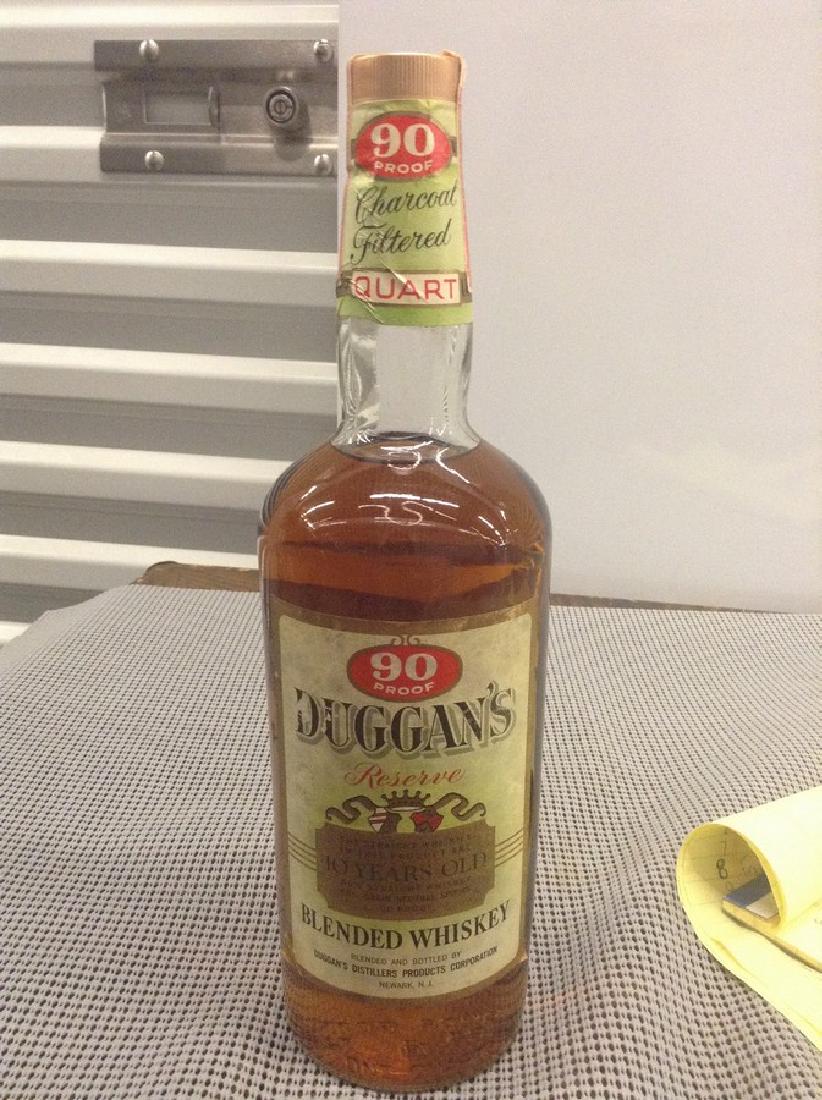 Duggan's Reserve Blended Whiskey: Any contents in bottle is Free; You are bidding on the bottle & unbroken tax stamp