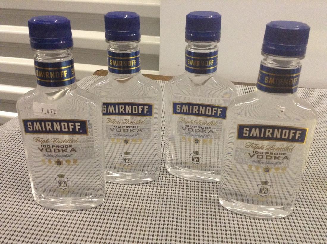 Lot of 4 Sminoff Vodka Small Bottle: Any contents in bottle is Free; You are bidding on the bottle & unbroken tax stamp