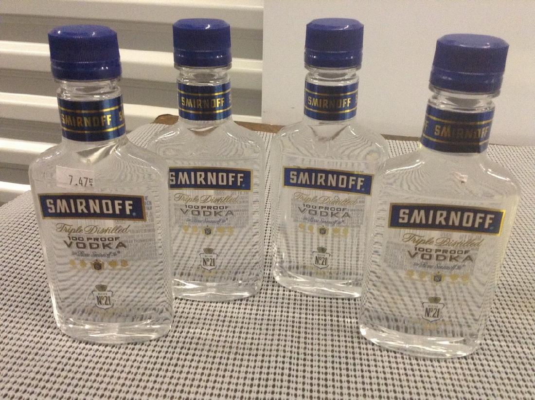 Lot of 4 Sminoff Vodka Small Bottle: Any contents in bottle is Free; You are bidding on the bottle & unbroken tax stamp