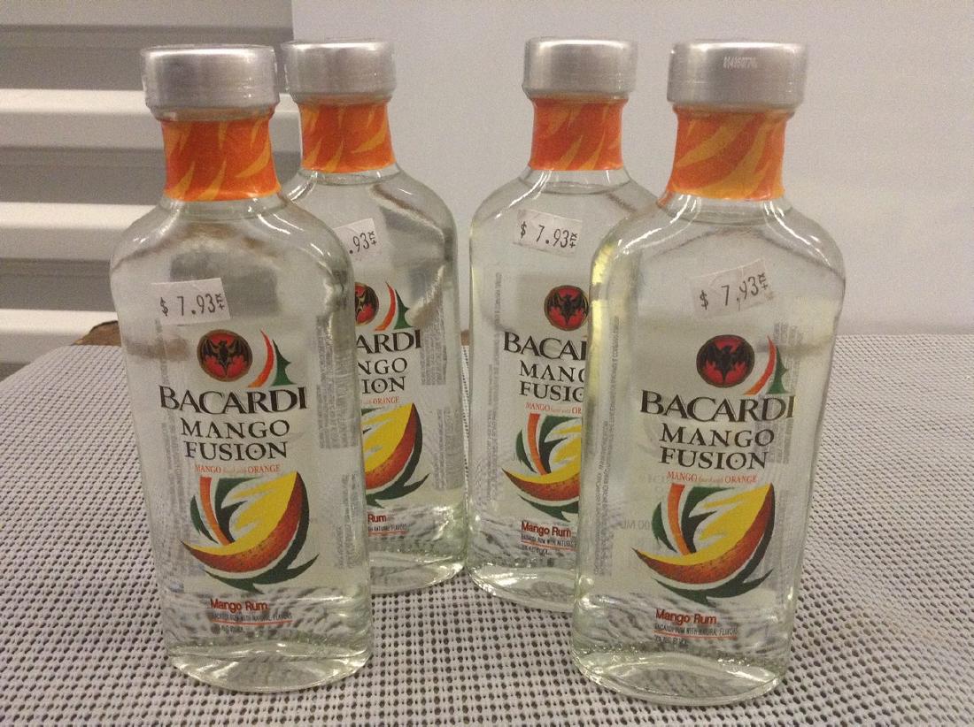 Lot of 4 Bacardi Mango Fusion Bottles: Any contents in bottle is Free; You are bidding on the bottle & unbroken tax stamp