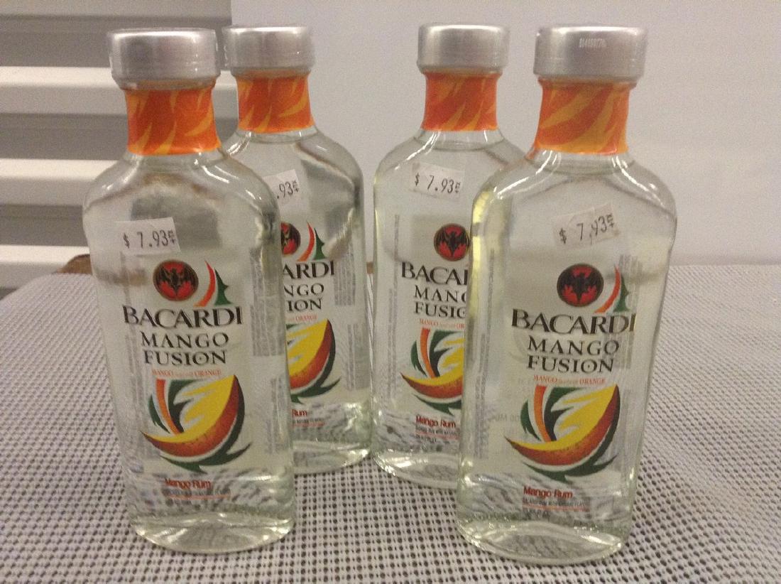 Lot of 4 Bacardi Mango Fusion Bottles: Any contents in bottle is Free; You are bidding on the bottle & unbroken tax stamp