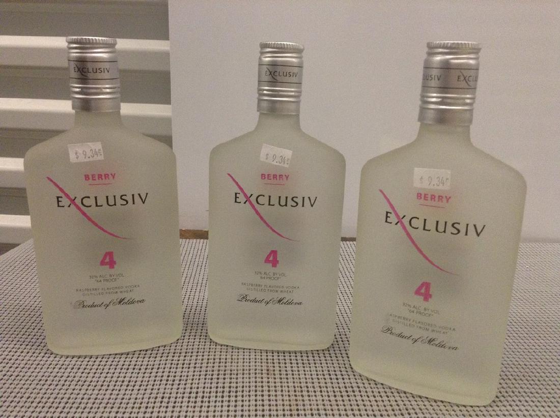 Lot of 3 Bottles of Exclusiv 4 Berry: Any contents in bottle is Free; You are bidding on the bottle & unbroken tax stamp