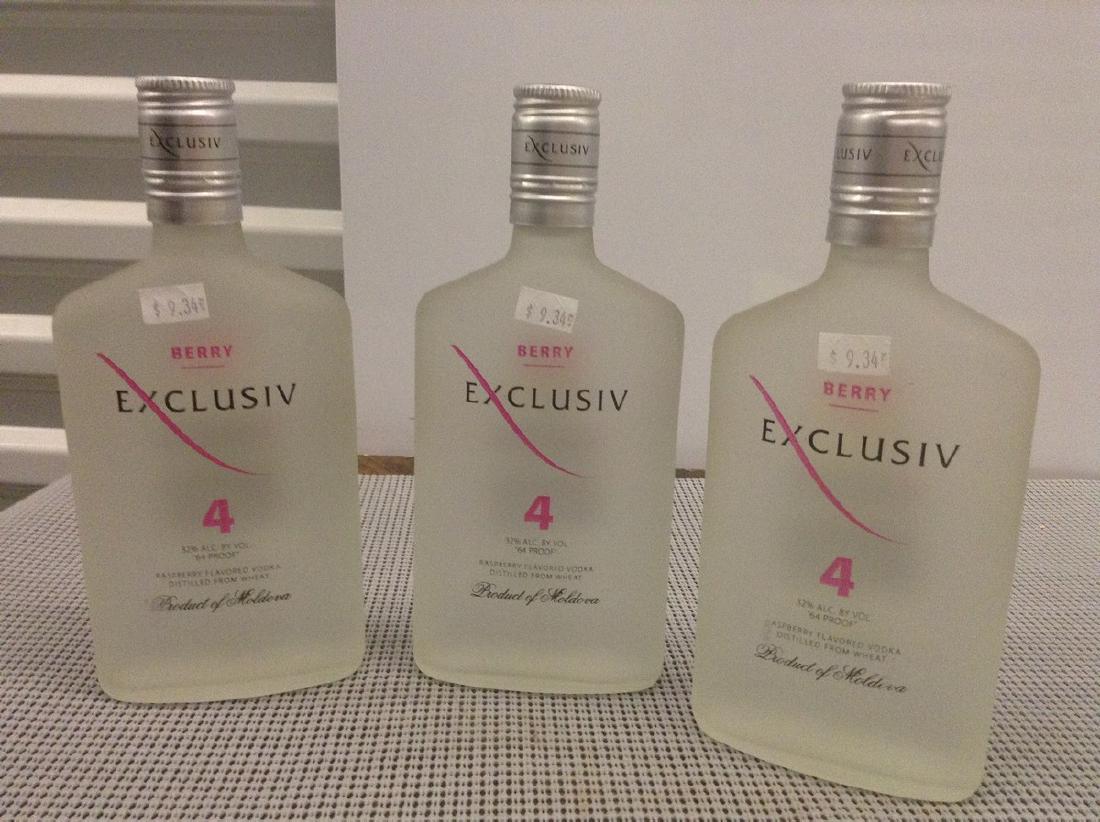 Lot of 3 Bottles of Exclusiv 4 Berry: Any contents in bottle is Free; You are bidding on the bottle & unbroken tax stamp