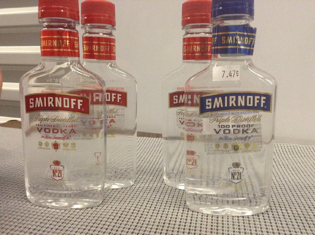 Lot of 4 Mixed Sminoff Bottles (1 of 1)