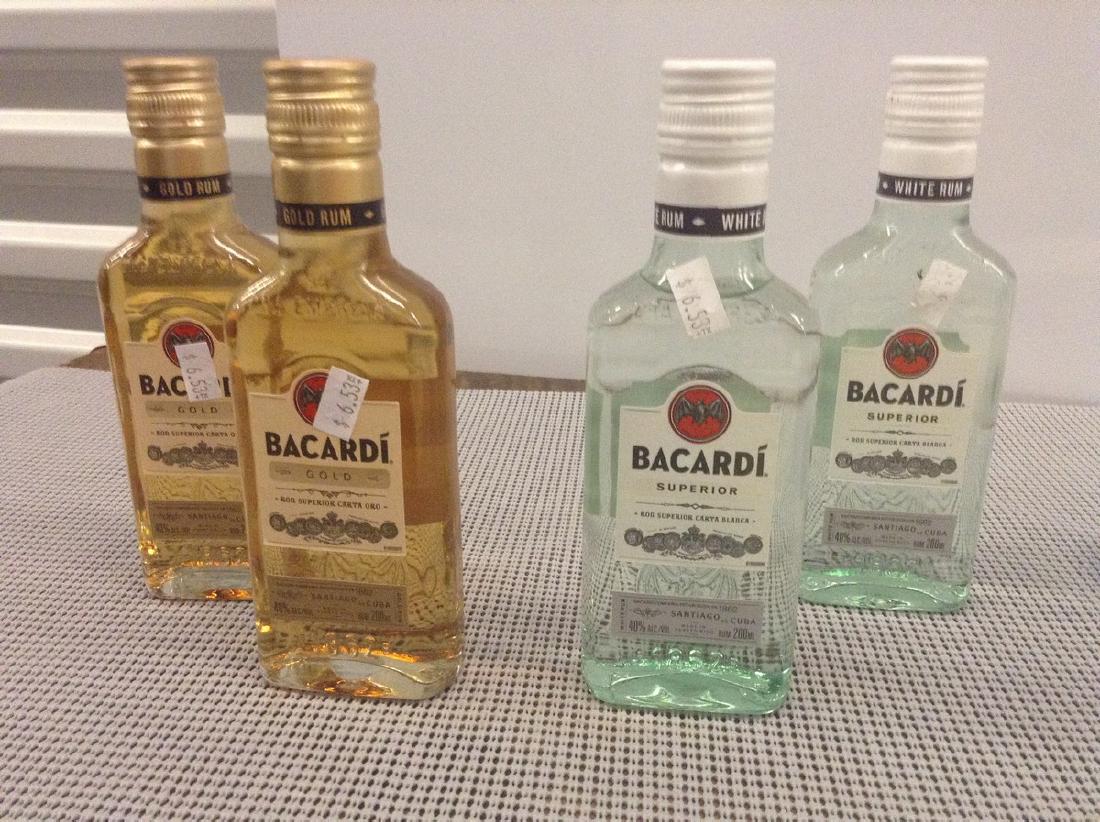 Lot of 4 Mixed rum (1 of 1)