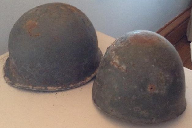 2 World War II Helmets (1 of 1)