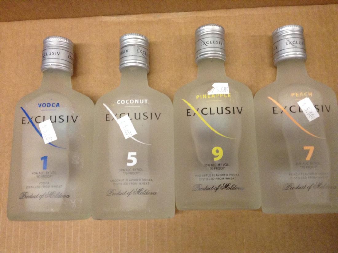 Lot of 4 mixed Exclusiv Vodka: Any contents in bottle is Free; You are bidding on the bottle & unbroken tax stamp
