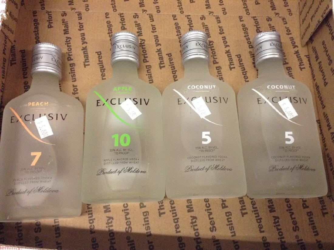 Lot of 4 mixed Exclusiv Vodka: Any contents in bottle is Free; You are bidding on the bottle & unbroken tax stamp