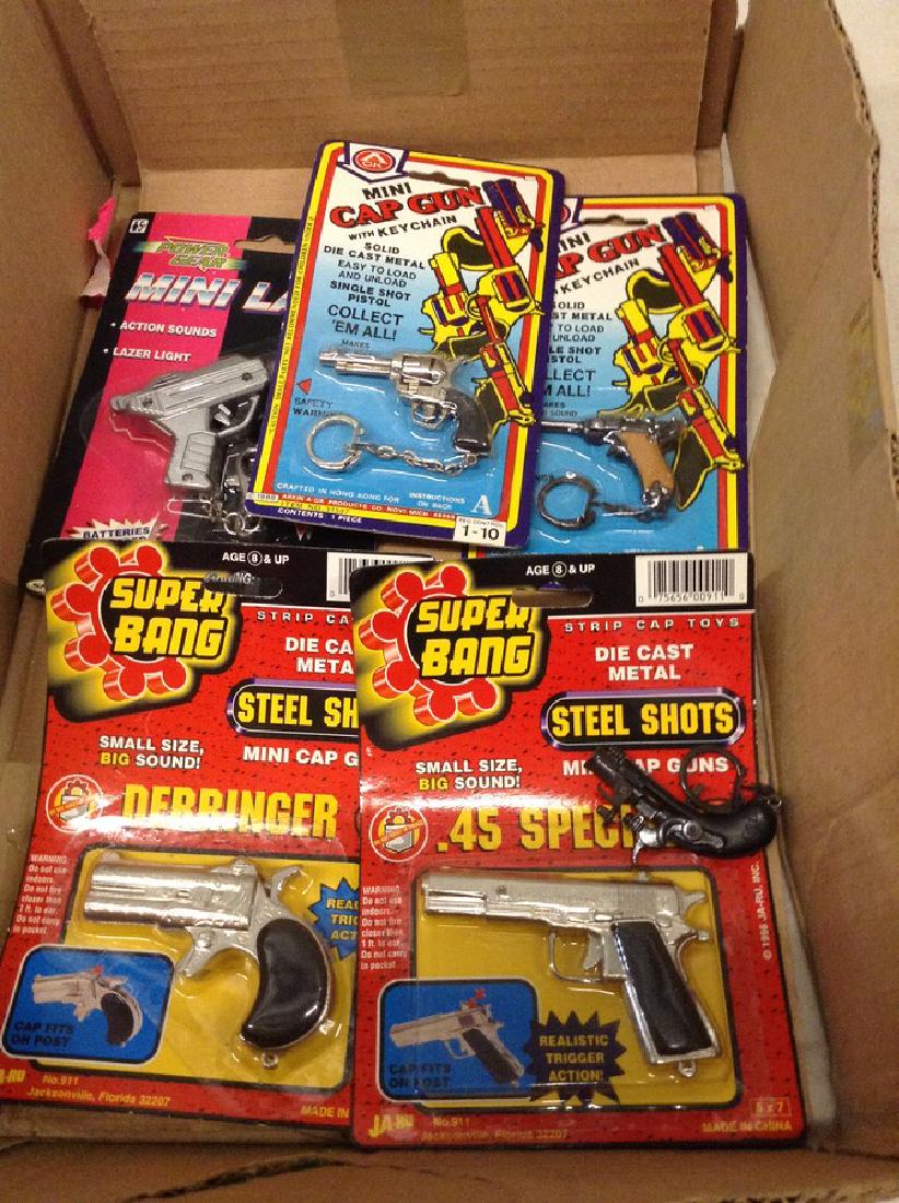 lot of toy cap guns: lot of toy cap guns