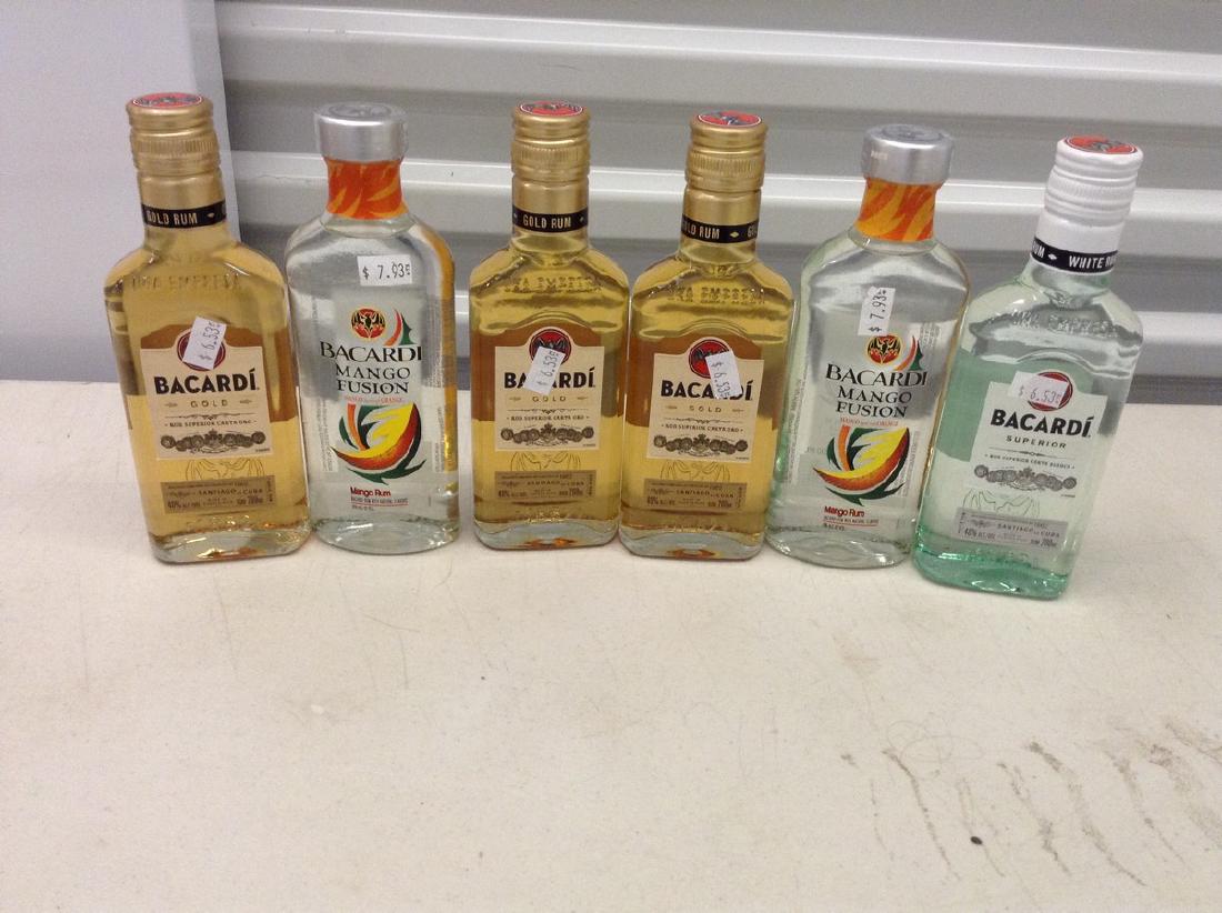 lot of 6 bottles of mixed Bacardi Rum: Any contents in bottle is Free; You are bidding on the bottle & unbroken tax stamp