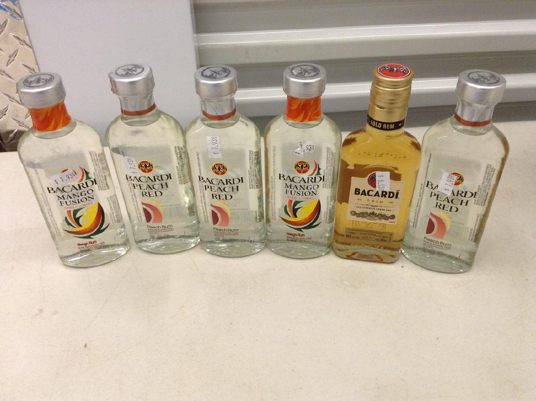 lot of 6 bottles of mixed Bacardi Rum: Any contents in bottle is Free; You are bidding on the bottle & unbroken tax stamp