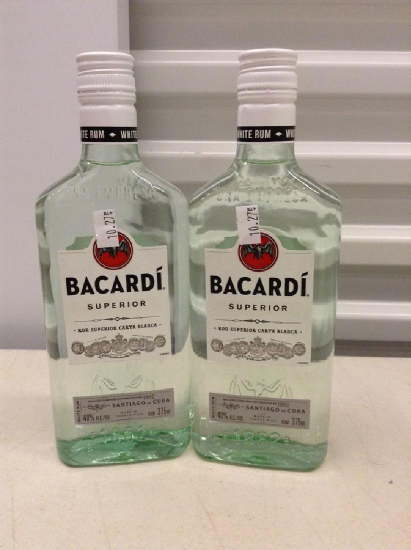 Lot of 2 Bacardi Superior Rum: Any contents in bottle is Free; You are bidding on the bottle & unbroken tax stamp