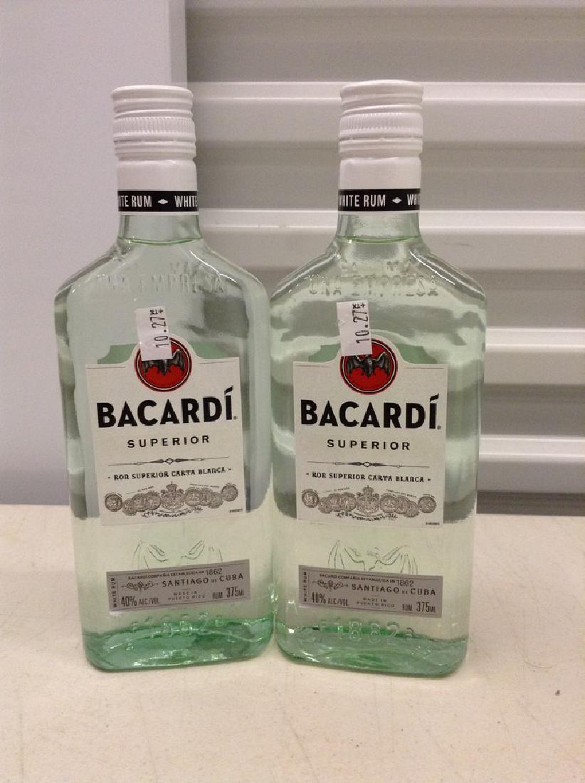 Lot of 2 Bacardi Superior Rum: Any contents in bottle is Free; You are bidding on the bottle & unbroken tax stamp