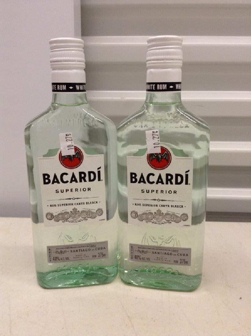 Lot of 2 Bacardi Superior Rum: Any contents in bottle is Free; You are bidding on the bottle & unbroken tax stamp