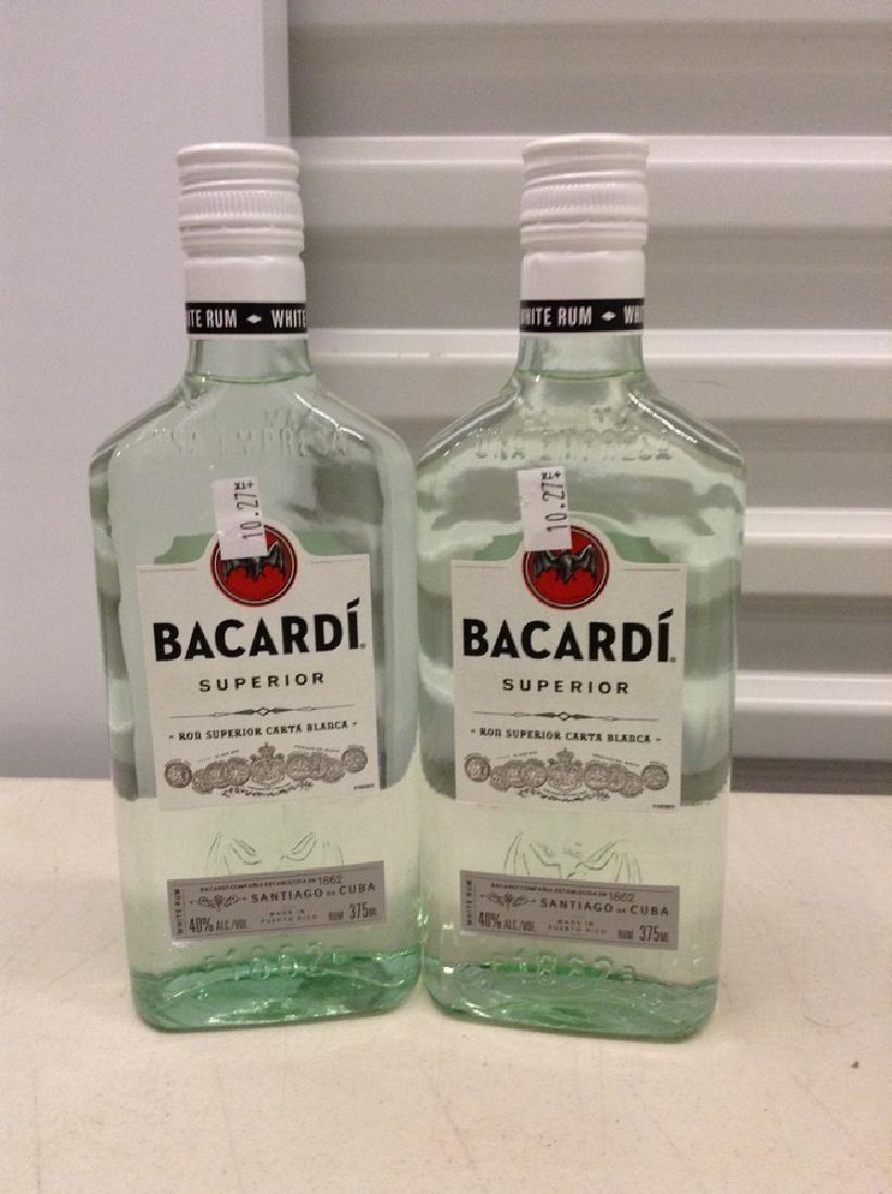 Lot of 2 Bacardi Superior Rum: Any contents in bottle is Free; You are bidding on the bottle & unbroken tax stamp