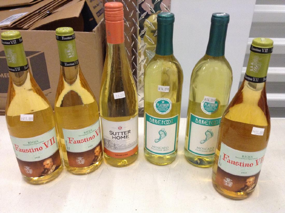 6 bottles of wine: Any contents in bottle is Free; You are bidding on the bottle & unbroken tax stamp