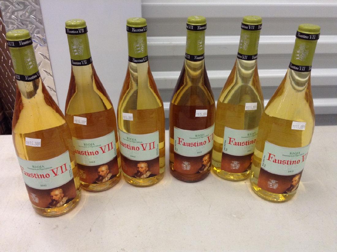 Lot of 6 Faustino VII Rioja: Any contents in bottle is Free; You are bidding on the bottle & unbroken tax stamp