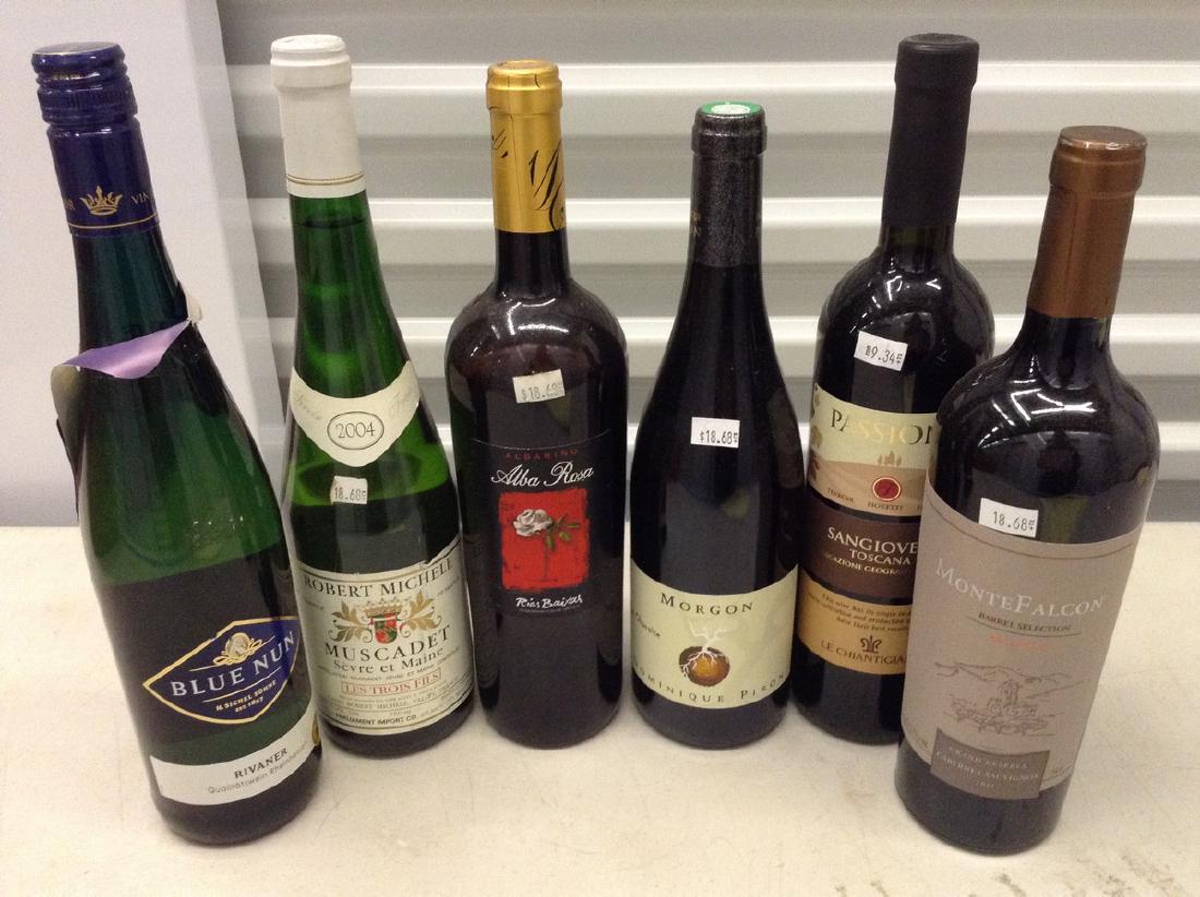6 bottles of wine: Any contents in bottle is Free; You are bidding on the bottle & unbroken tax stamp