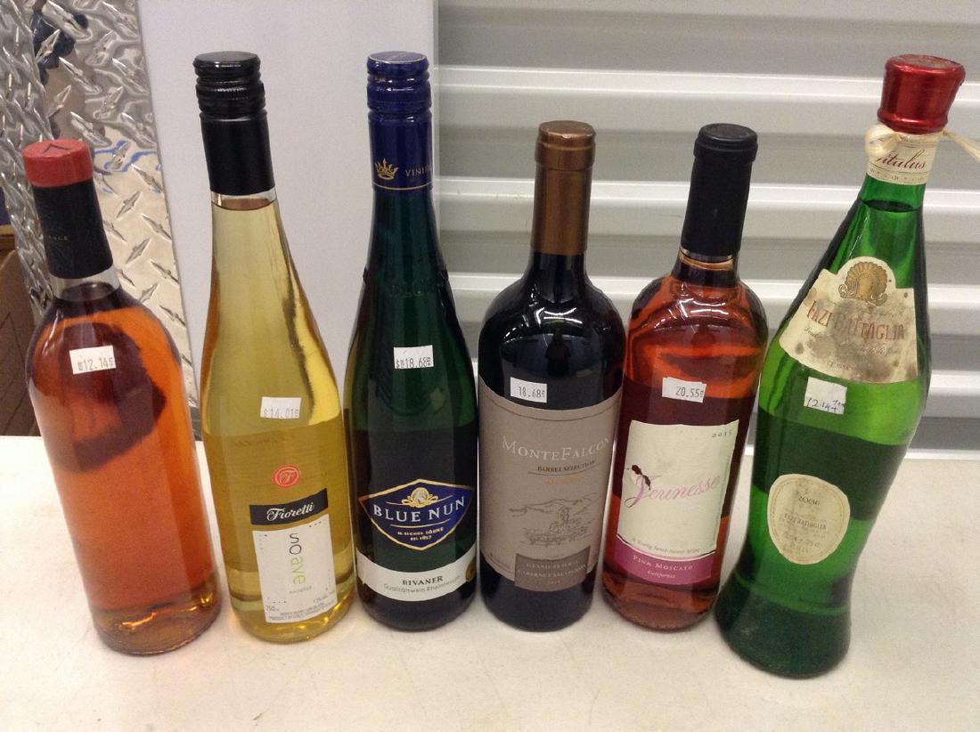 6 bottles of wine: Any contents in bottle is Free; You are bidding on the bottle & unbroken tax stamp