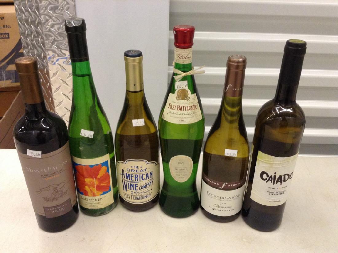 6 bottles of wine: Any contents in bottle is Free; You are bidding on the bottle & unbroken tax stamp
