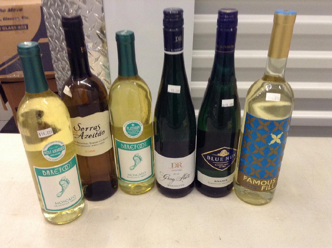 6 bottles of wine: Any contents in bottle is Free; You are bidding on the bottle & unbroken tax stamp