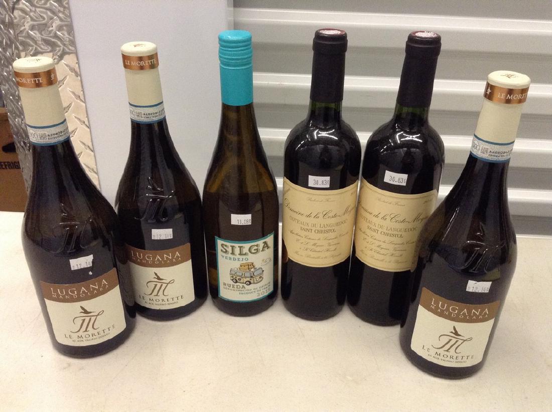 6 bottles of wine: Any contents in bottle is Free; You are bidding on the bottle & unbroken tax stamp