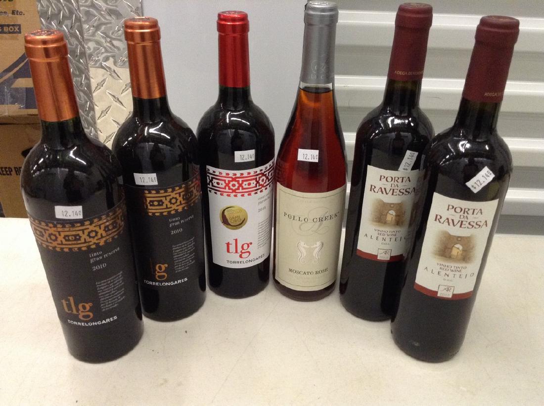 6 bottles of wine: Any contents in bottle is Free; You are bidding on the bottle & unbroken tax stamp