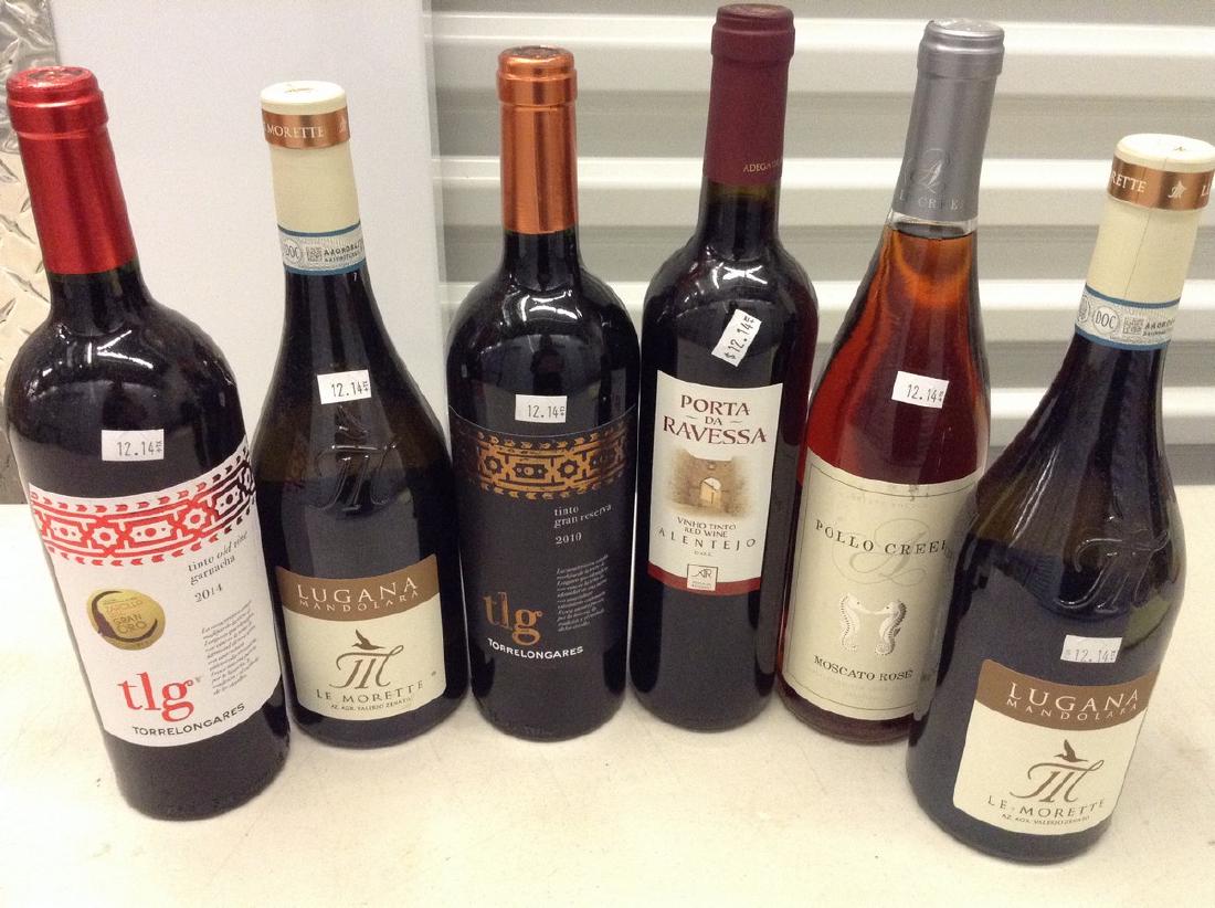 6 bottles of wine: Any contents in bottle is Free; You are bidding on the bottle & unbroken tax stamp