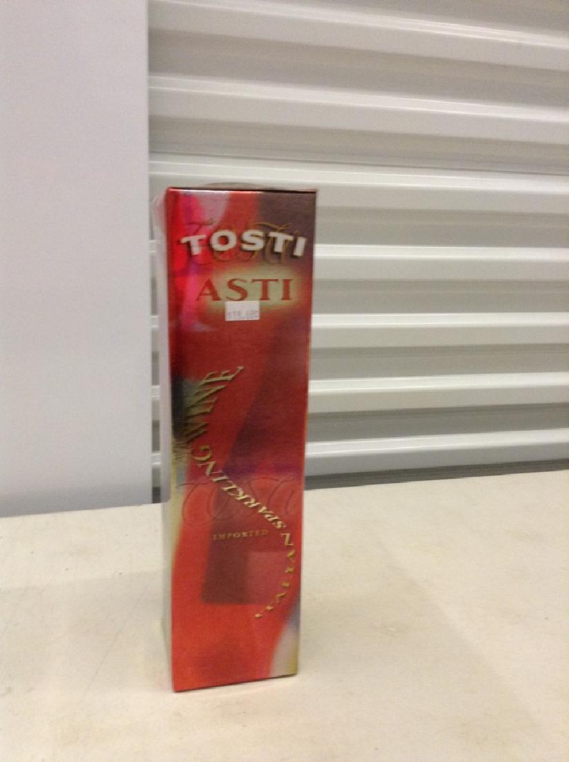 Tosti Asti 750ml Bottle with box: Any contents in bottle is Free; You are bidding on the bottle & unbroken tax stamp