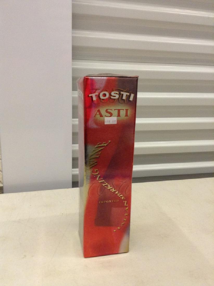 Tosti Asti 750ml Bottle with box: Any contents in bottle is Free; You are bidding on the bottle & unbroken tax stamp