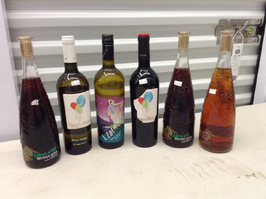Lot of 6 Bottles of wine: Any contents in bottle is Free; You are bidding on the bottle & unbroken tax stamp