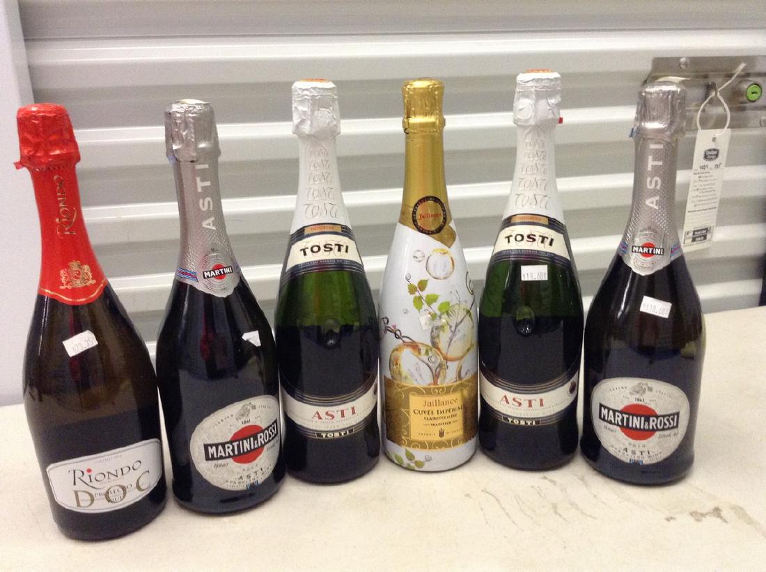 Lot of 6 bottles of Champane: Any contents in bottle is Free; You are bidding on the bottle & unbroken tax stamp