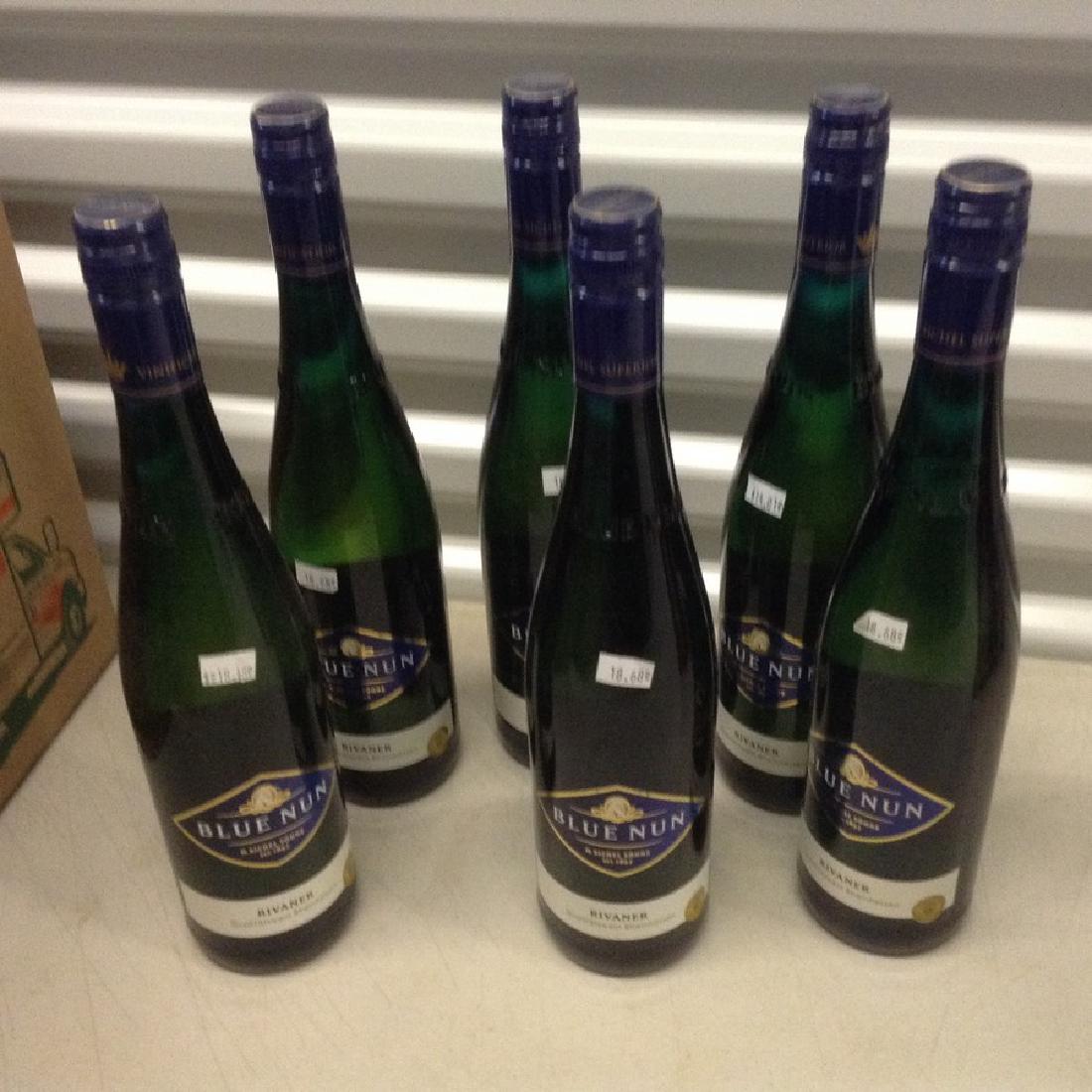 lot of 6 Blue Nun Rivaner: Any contents in bottle is Free; You are bidding on the bottle & unbroken tax stamp